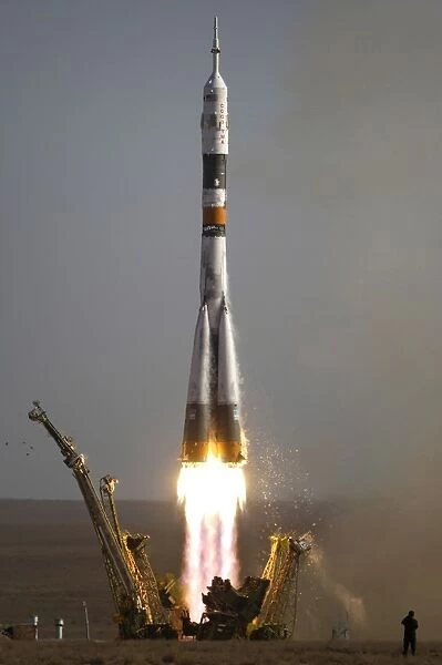 The Soyuz TMA-9 spacecraft launches from the Baikonur Cosmodrome