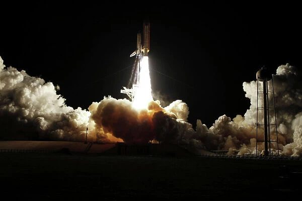 Space shuttle Discovery lifts off from Launch Pad 39A at Kennedy Space Center in Florida