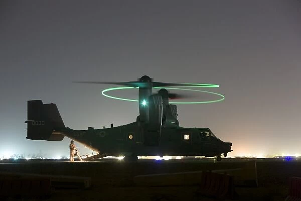 A special forces CV-22 Osprey with rotor lights on, Iraq