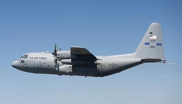 A specially modified C-130 Hercules in flight