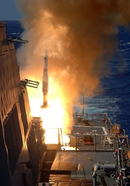 A Standard Missile 2 launches from the aft Vertical Launching System aboard USS O Kane