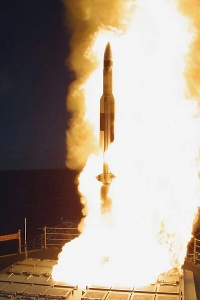 A Standard Missile Three is launched from the Mark 41 Vertical Launch System onboard