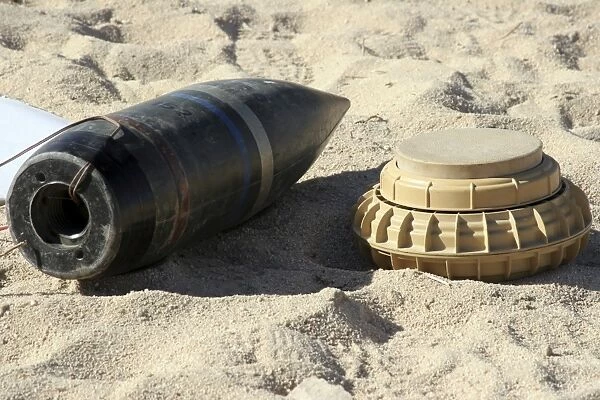 A static display of a converted ordnance shell and a simple mine