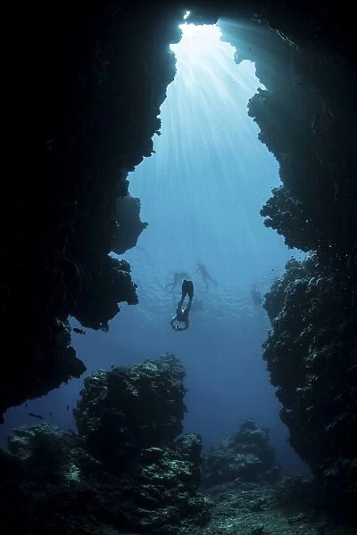 Sunlight descends underwater and into a crevice on Palaus barrier reef