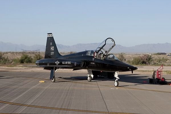 A T-38 pilot prepares to taxi his aircraft for a training mission