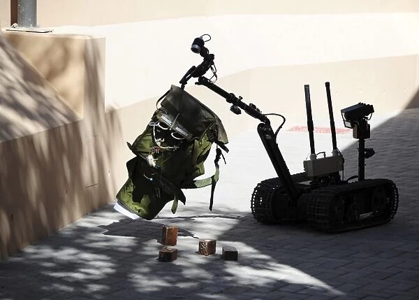 Talon remote-controlled robot investigates an improvised explosive device