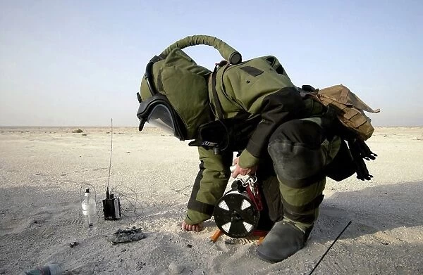 A technician dressed in a EOD-8 Explosive Ordnance Disposal Suit