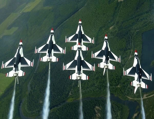 The Thunderbird aerial demonstration team performs a loop while in the Delta formation