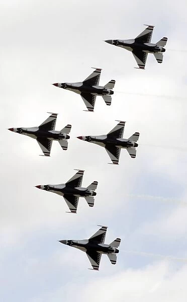 The Thunderbirds form a 6-ship Delta formation