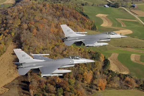 A two-ship formation of F-16 Fighting Falcons on a routine training mission