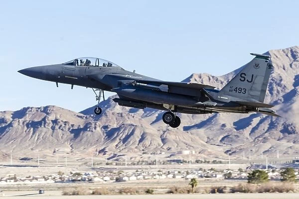 A U. S. Air Force F-15E Strike Eagle landing at Nellis Air Force Base, Nevada