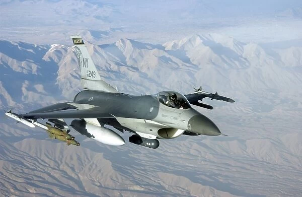 A U. S. Air Force F-16C Fighting Falcon in flight over Afghanistan