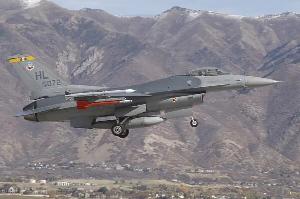 A U. S. Air Force F-16C Fighting Falcon landing at Hill Air Force Base, Utah