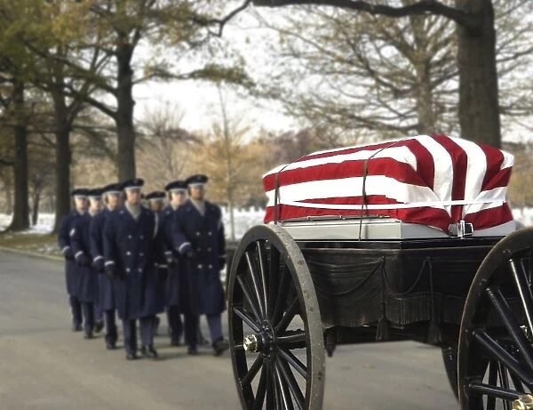 U. S. Air Force Honor Guardsmen lead the caisson carrying the remains of two airmen
