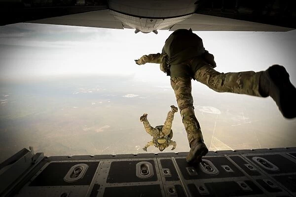 U. S. Army Green Berets jump out of a C-130H3 Hercules over Florida