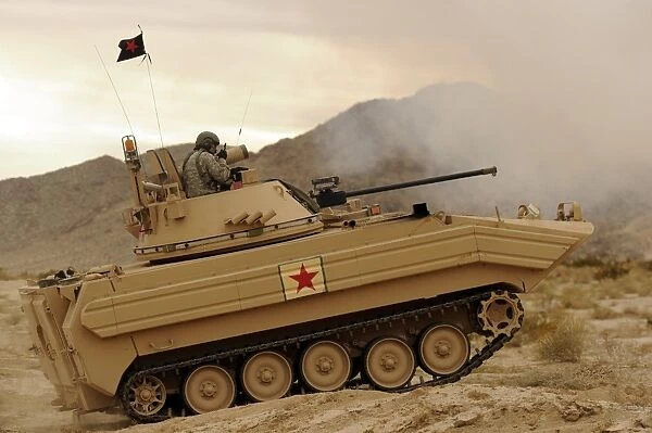 A U. S. Army soldier trains on an M113 armed personnel carrier