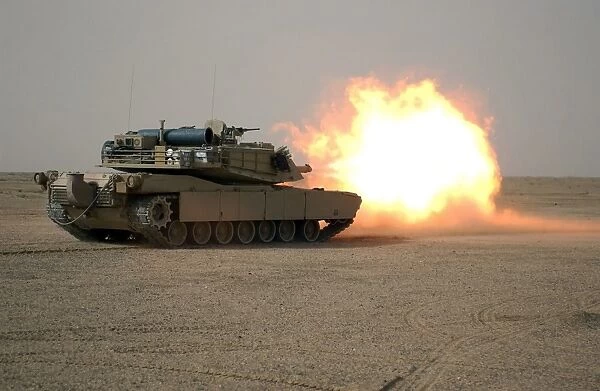 U. S. Marine Corps personnel fire their M1A1 Main Battle Tank gun