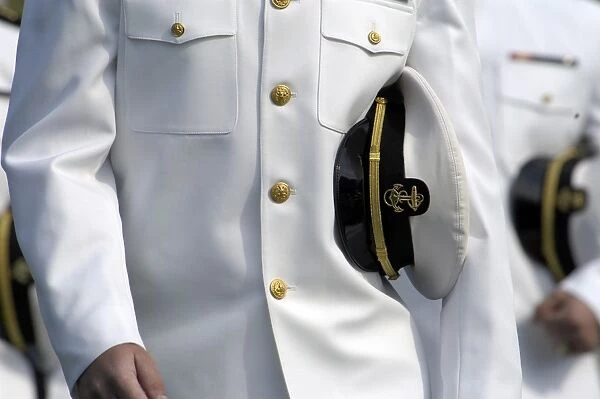 U. S. Naval Academy midshipman in dress uniform with combination cover