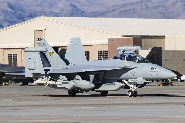 A U. S. Navy E  /  A-18G Growler taxis out for takeoff at Nellis Air Force Base, Nevada
