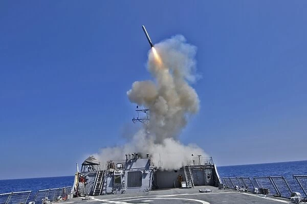 USS Barry launches a Tomahawk cruise missile