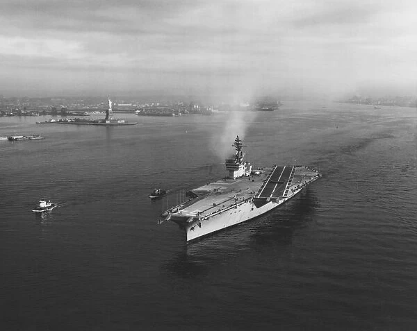 USS Constellation leaving New York Harbor for builders trials, 1961