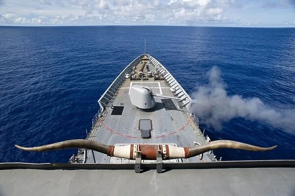 USS Cowpens fires its Mk 45 Mod 2 gun