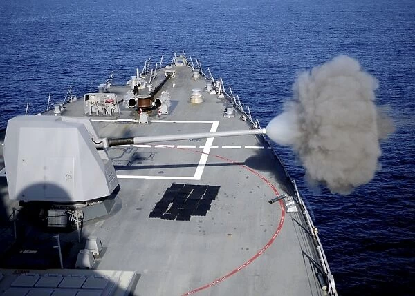 USS Halsey fires its MK-45 5-inch  /  54-caliber lightweight gun