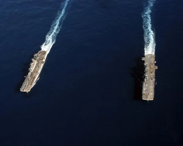 USS Iwo Jima steams alongside USS Kearsarge during a weapons off-load