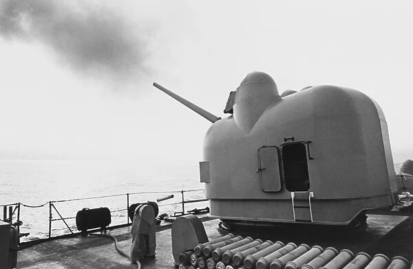 USS Turner Joy firing one of its Mark 42 gun mounts, Vietnam War, 1968