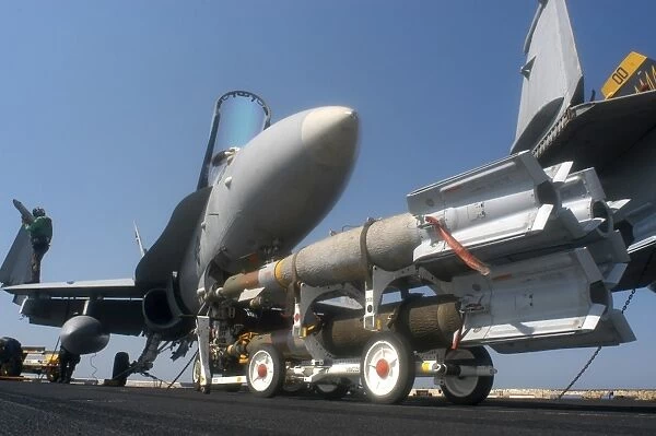 A weapons skid carrying 500-pound (GBU-12) laser guided bombs