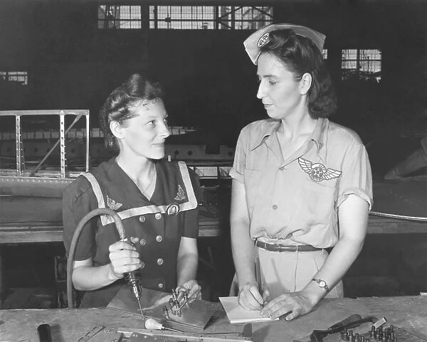 Women working in the Assembly and Repair Dept. of Naval Air Base, Corpus Christi, Texas