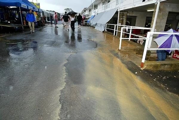 f2371. A Flooded pit lane with one of the many rain storms that effected the racing
