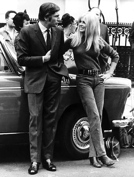 Brigitte Bardot actress & husband Gunther Sachs chatting during a break in filming Two