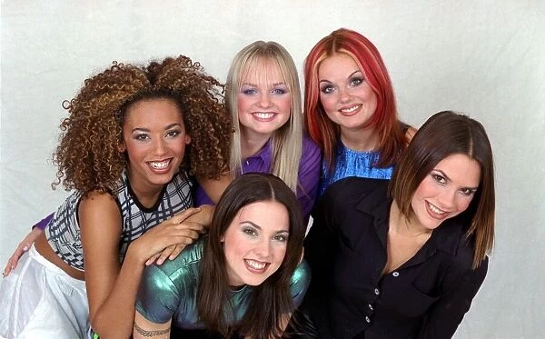 British all girl pop group The Spice Girls pose for a group photograph in the Daily