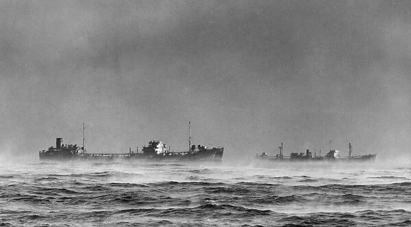 British Royal Navy ships passing through Arctic fog while on convoy duty in the Nothern