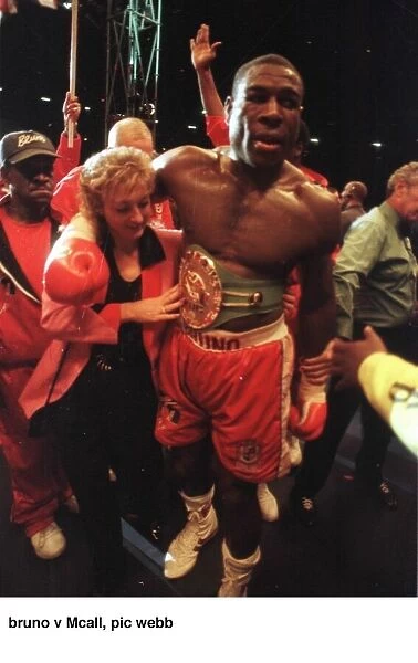 Frank Bruno with his wife after defeating Oliver McCall for the Heavyweight Title