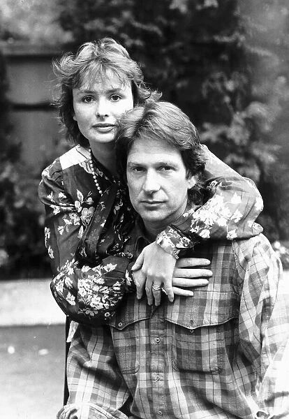 Michael Brandon actor poses with screen wife actress Lucy Gutteridge in Tales of