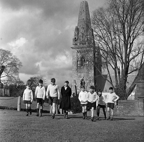 Scholars and choirboys of Llandaff Cathedral, South Wales, on their way to play rugby
