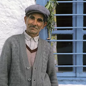 Old man in cloth cap - Thassos, Greece