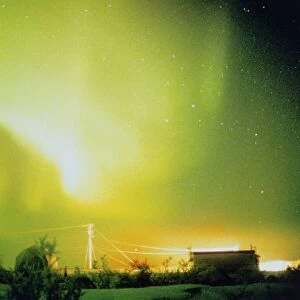 Aurora Borealis and satellite station in Canada