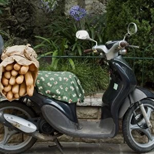 Baguettes on back on scooter, Monaco, Europe