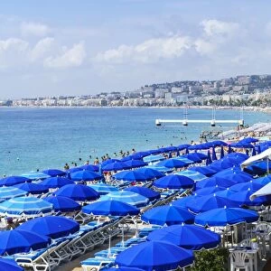 Blue parasols on the beach, Promenade des Anglais, Nice, Alpes Maritimes, Cote d Azur