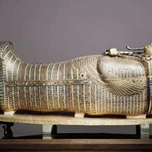 The second mummiform coffin made from gold-plated wood inlaid with glass-paste