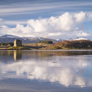 Castle Stalker reflected on Loch Laich, an inlet off Loch Linnhe in the Scottish