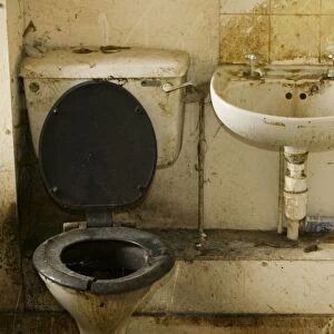 A disgustingly dirty bathroom in an abandoned council house in Carlisle Cumbria UK