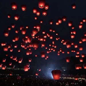 People release sky lanterns ahead of the traditional Chinese Lantern Festival in Pingxi