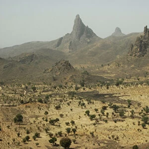 CAMEROON, Rhumsiki. Rocks rising in the middle of an arid landscape