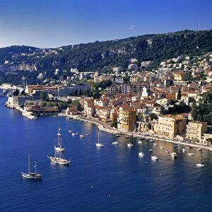 Europe, France, Villefranche. Pleasure boats moor in the small harbor at Villefranche