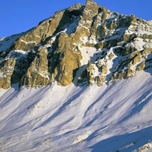 USA, Alaska, Brooks Range. Snow covered mountains tower over the Trans-Alaskan Oil