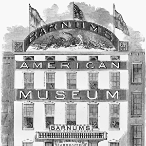 BARNUMs MUSEUM, 1865. View of P. T. Barnums American Museum, on Broadway between Spring and Prince Streets, New York City. Wood engraving, 1865
